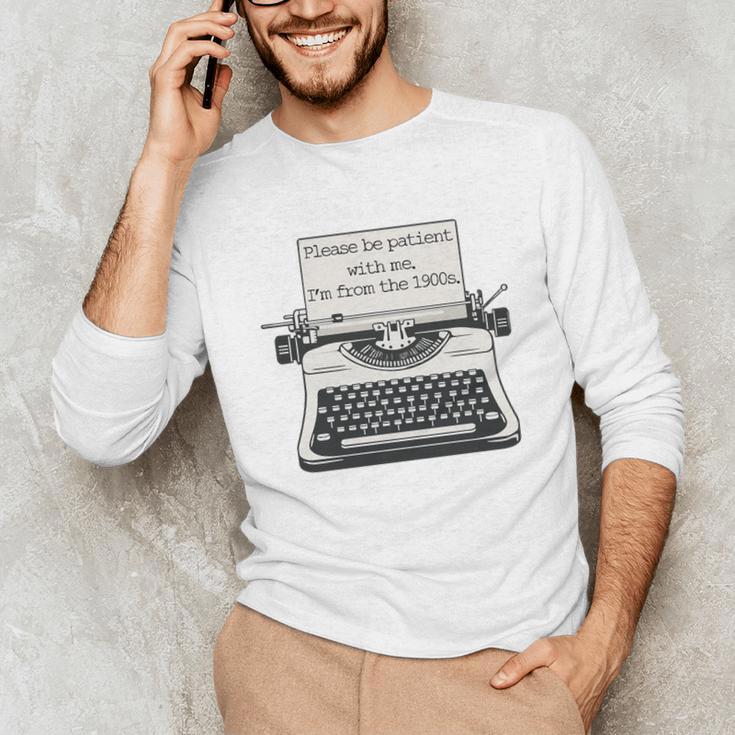 Please Be Patient With Me I'm From The 1900s Typewriter Premium Tri-Blend Unisex Long Sleeve T-Shirt
