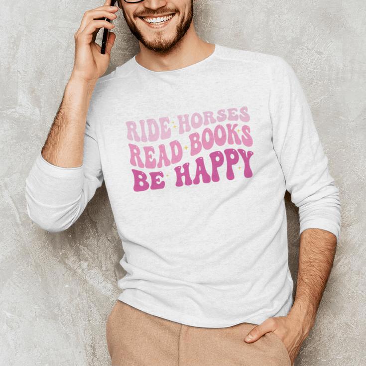 Ride Horses Read Books Be Happy Groovy Book Horse Premium Unisex Long Sleeve T-Shirt Ride Horses Read Books Be Happy Groovy Book Horse Premium Unisex Long Sleeve T-Shirt