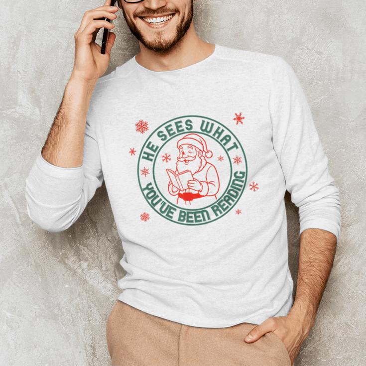 He Sees What You'Ve Been Reading Christmas Book Lover Shirt Unisex Long Sleeve T-Shirt He Sees What You'Ve Been Reading Christmas Book Lover Shirt Unisex Long Sleeve T-Shirt