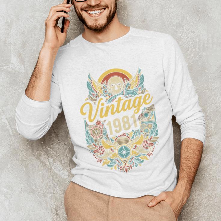 Vintage 1981 Retro Badge Nostalgia Eighties Compass Skull Premium Tri-Blend Unisex Long Sleeve T-Shirt