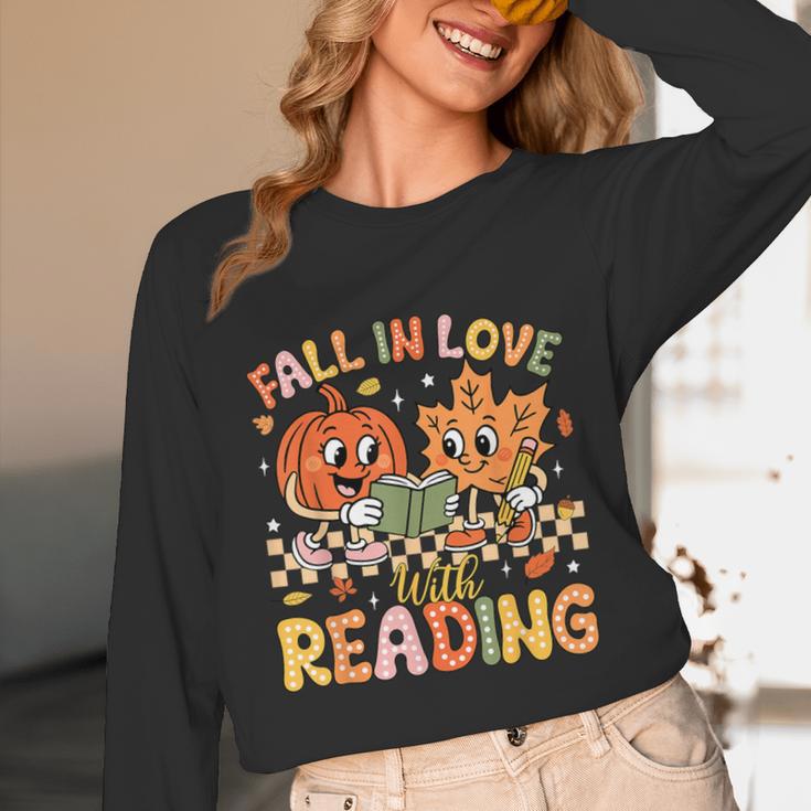 Fall In Love With Reading Autumn Pumpkin Teacher Book Lover Unisex Long Sleeve T-Shirt Fall In Love With Reading Autumn Pumpkin Teacher Book Lover Unisex Long Sleeve T-Shirt