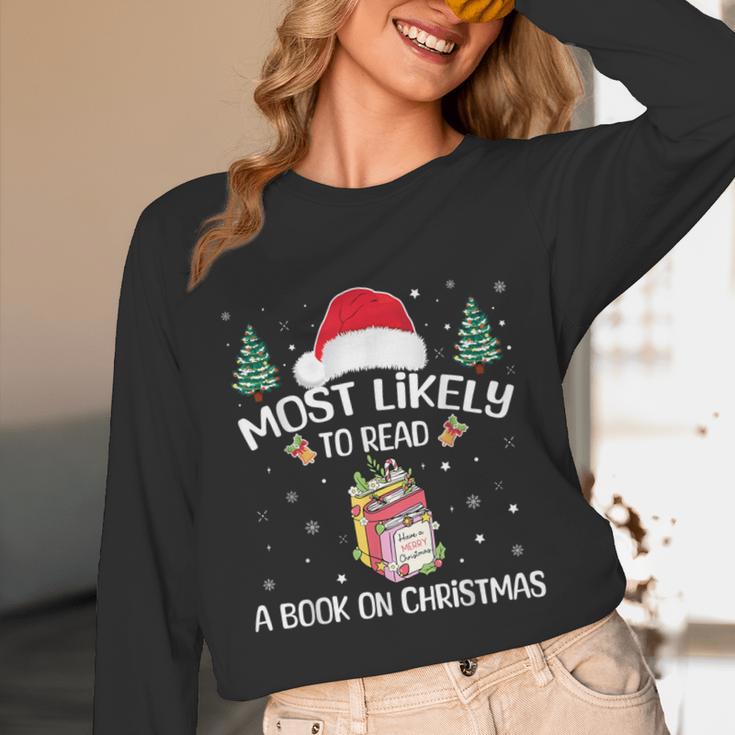 Most Likely To Read A Book On Christmas Love Reading Books Unisex Long Sleeve T-Shirt