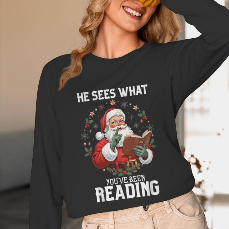 He Sees What You'Ve Been Reading Santa Book Lover Unisex Long Sleeve T-Shirt He Sees What You'Ve Been Reading Santa Book Lover Unisex Long Sleeve T-Shirt