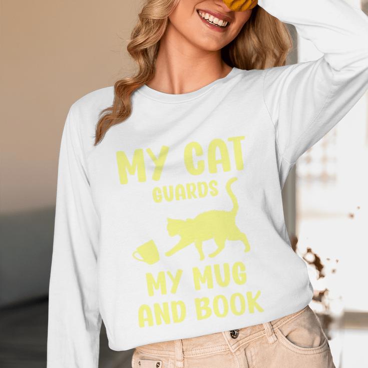 My Cat Guards My Mug And Book Humor Cats Premium Tri-Blend Unisex Long Sleeve T-Shirt