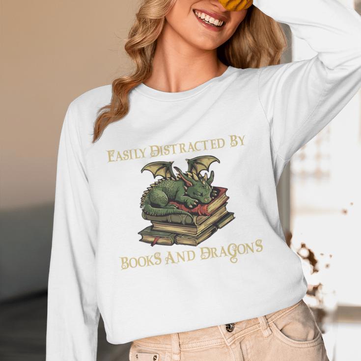Easily Distracted By Books And Dragons Graphic Premium Unisex Long Sleeve T-Shirt Easily Distracted By Books And Dragons Graphic Premium Unisex Long Sleeve T-Shirt