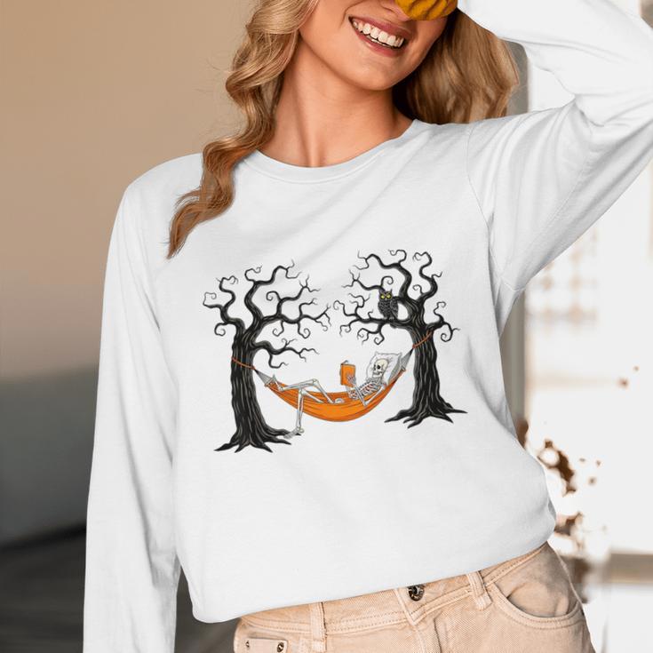 Skeleton Reading Book In Hammock Halloween Reader Unisex Long Sleeve T-Shirt Skeleton Reading Book In Hammock Halloween Reader Unisex Long Sleeve T-Shirt
