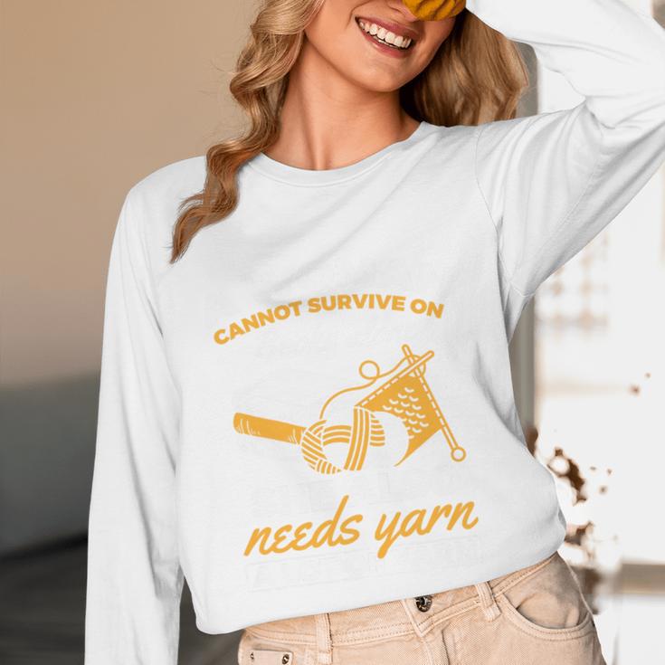 Woman Survives On Books Yarn Knitting Crochet Premium Tri-Blend Unisex Long Sleeve T-Shirt Woman Survives On Books Yarn Knitting Crochet Premium Tri-Blend Unisex Long Sleeve T-Shirt