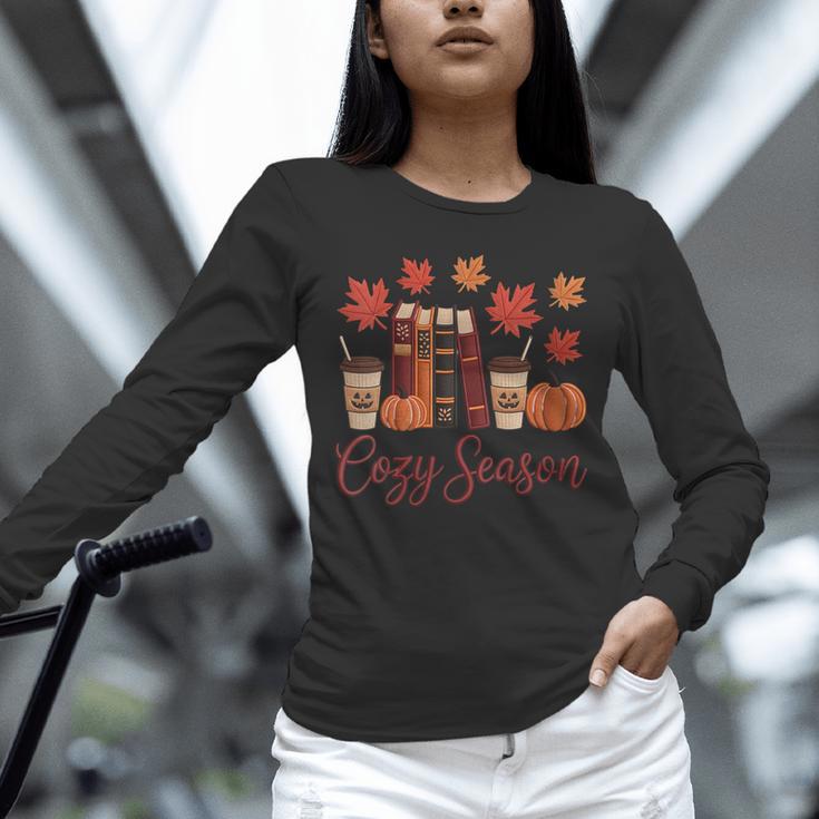 Cozy Season Autumn Leaves Books Pumpkins Fall Halloween Unisex Long Sleeve T-Shirt Cozy Season Autumn Leaves Books Pumpkins Fall Halloween Unisex Long Sleeve T-Shirt