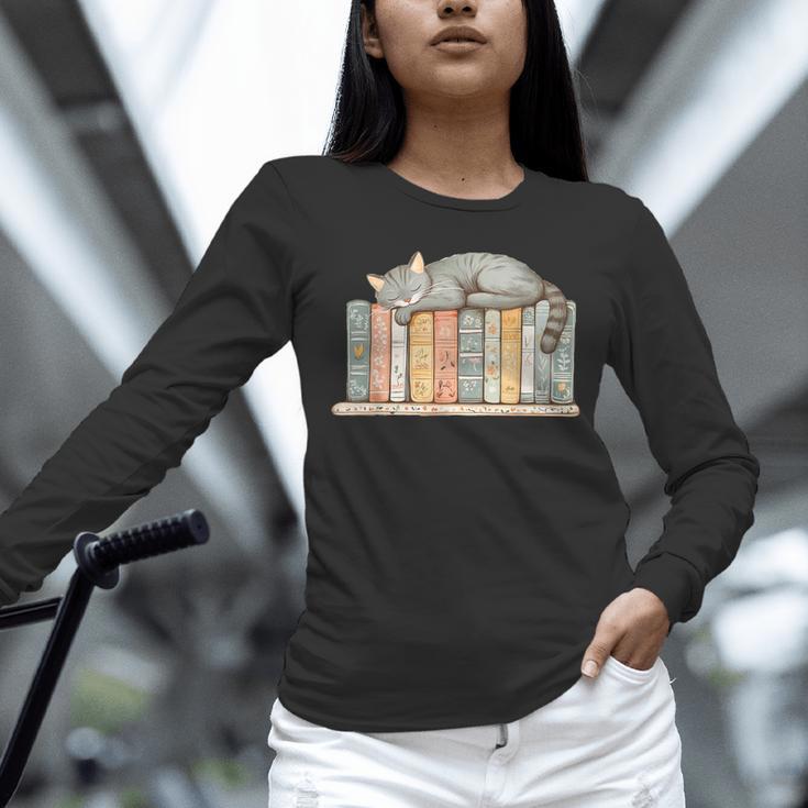 Cute Cat Sleeping On Books Unisex Long Sleeve T-Shirt Cute Cat Sleeping On Books Unisex Long Sleeve T-Shirt