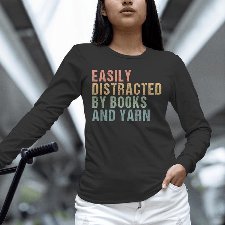 Easily Distracted By Books And Yarn Knitting & Crocheting Unisex Long Sleeve T-Shirt Easily Distracted By Books And Yarn Knitting & Crocheting Unisex Long Sleeve T-Shirt