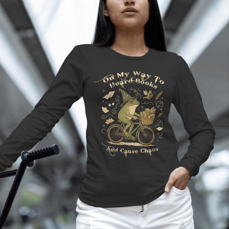 On My Way To Hoard Books And Cause Chaos Tom Foolery Frog Unisex Long Sleeve T-Shirt On My Way To Hoard Books And Cause Chaos Tom Foolery Frog Unisex Long Sleeve T-Shirt