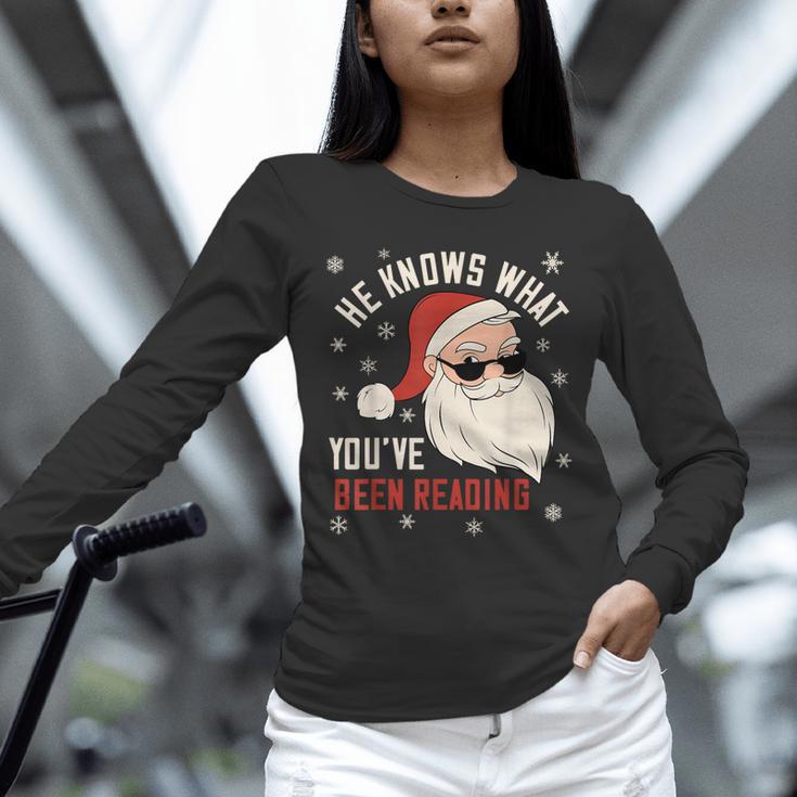 He Knows What You'Ve Been Reading Book Lover Women Santa Unisex Long Sleeve T-Shirt He Knows What You'Ve Been Reading Book Lover Women Santa Unisex Long Sleeve T-Shirt
