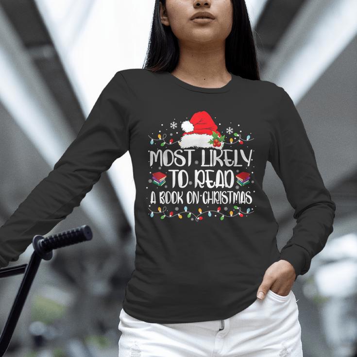 Most Likely To Read A Book On Christmas Family Matching Unisex Long Sleeve T-Shirt Most Likely To Read A Book On Christmas Family Matching Unisex Long Sleeve T-Shirt