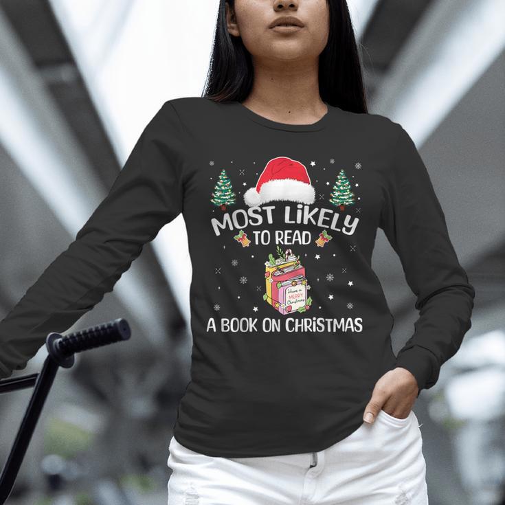 Most Likely To Read A Book On Christmas Love Reading Books Unisex Long Sleeve T-Shirt