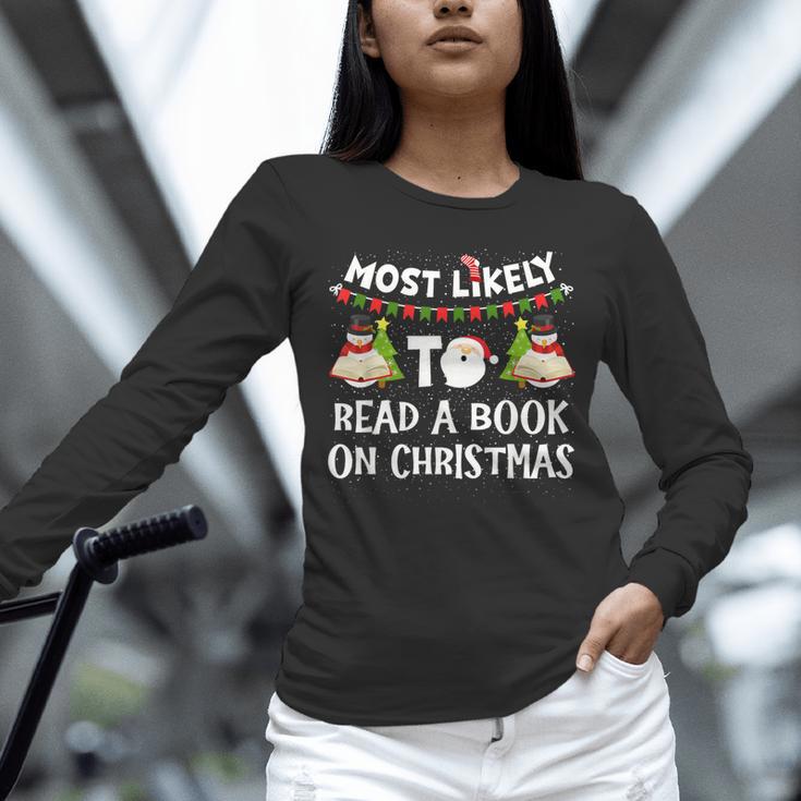Most Likely To Read A Book On Christmas Snowman Family Unisex Long Sleeve T-Shirt Most Likely To Read A Book On Christmas Snowman Family Unisex Long Sleeve T-Shirt
