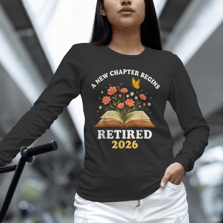 A New Chapter Begins Retired 2026 Floral Book Butterfly Tee Unisex Long Sleeve T-Shirt