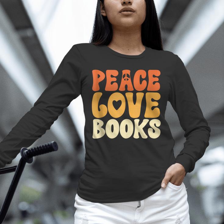 Peace Love Books Men Women Unisex Long Sleeve T-Shirt Peace Love Books Men Women Unisex Long Sleeve T-Shirt