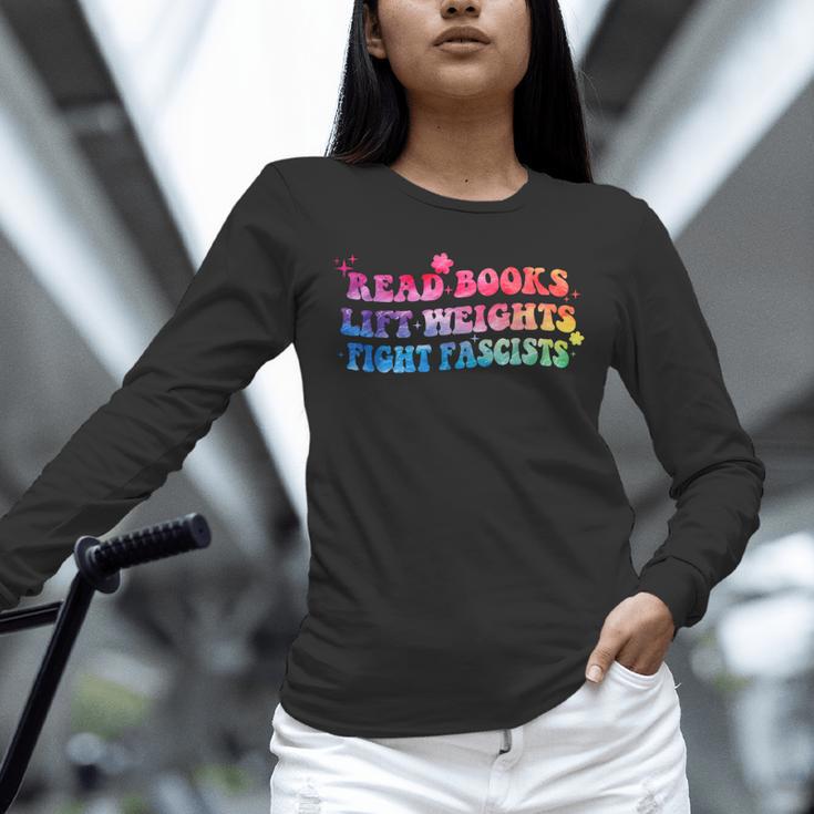 Read Books Lift Weights Fight Fascists Tie Dye Men Women Unisex Long Sleeve T-Shirt Read Books Lift Weights Fight Fascists Tie Dye Men Women Unisex Long Sleeve T-Shirt