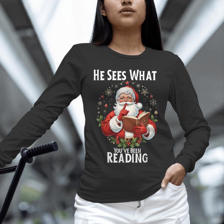 He Sees What You'Ve Been Reading Santa Book Lover For Women Unisex Long Sleeve T-Shirt He Sees What You'Ve Been Reading Santa Book Lover For Women Unisex Long Sleeve T-Shirt