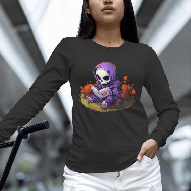 Spooky Grim Reaper Reading A Book Cute Creepy Halloween Unisex Long Sleeve T-Shirt Spooky Grim Reaper Reading A Book Cute Creepy Halloween Unisex Long Sleeve T-Shirt