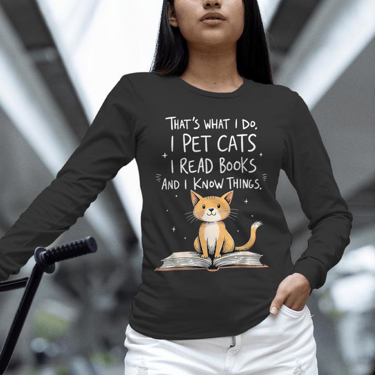 That's What I Do I Pet Cats I Read Books And I Know Things Unisex Long Sleeve T-Shirt