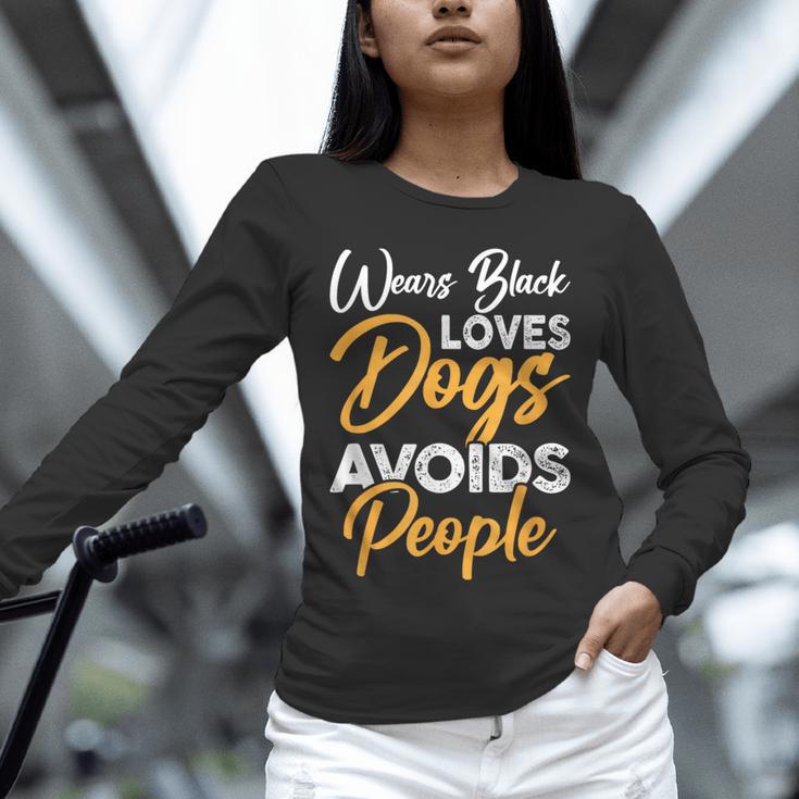 Wears Loves Dogs Avoids People I Introvert Unisex Long Sleeve T-Shirt Wears Loves Dogs Avoids People I Introvert Unisex Long Sleeve T-Shirt