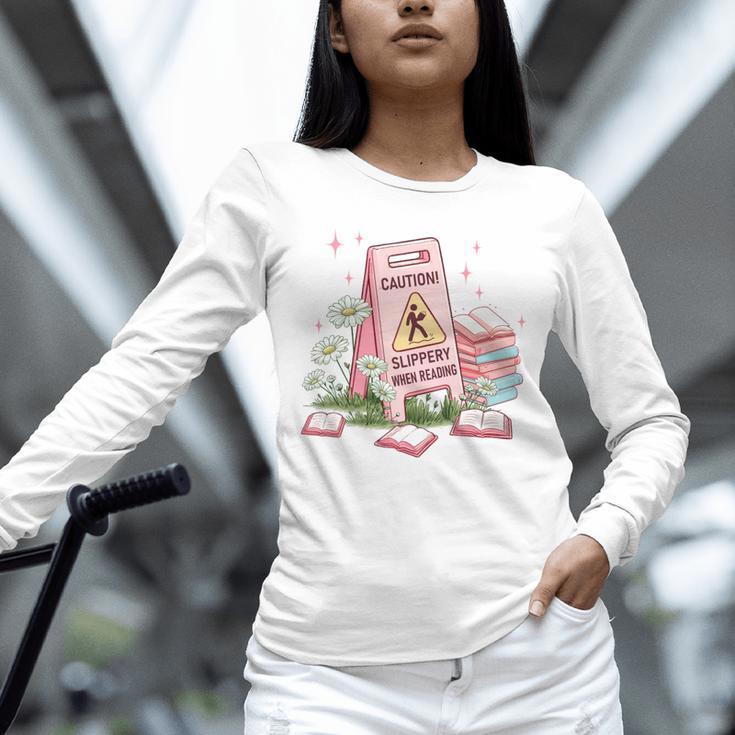 Caution Slippery When Reading Book Reader Unisex Long Sleeve T-Shirt