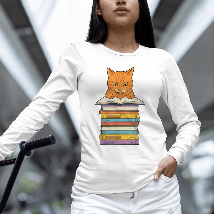 Cute Orange Tabby Cat Reading On Pile Of Books Unisex Long Sleeve T-Shirt Cute Orange Tabby Cat Reading On Pile Of Books Unisex Long Sleeve T-Shirt