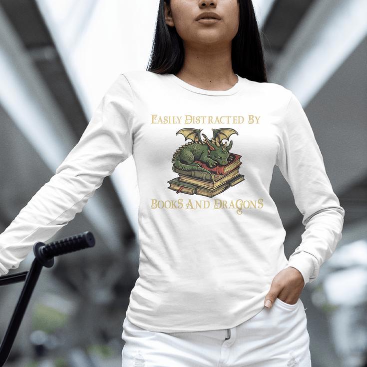 Easily Distracted By Books And Dragons Graphic Premium Unisex Long Sleeve T-Shirt Easily Distracted By Books And Dragons Graphic Premium Unisex Long Sleeve T-Shirt