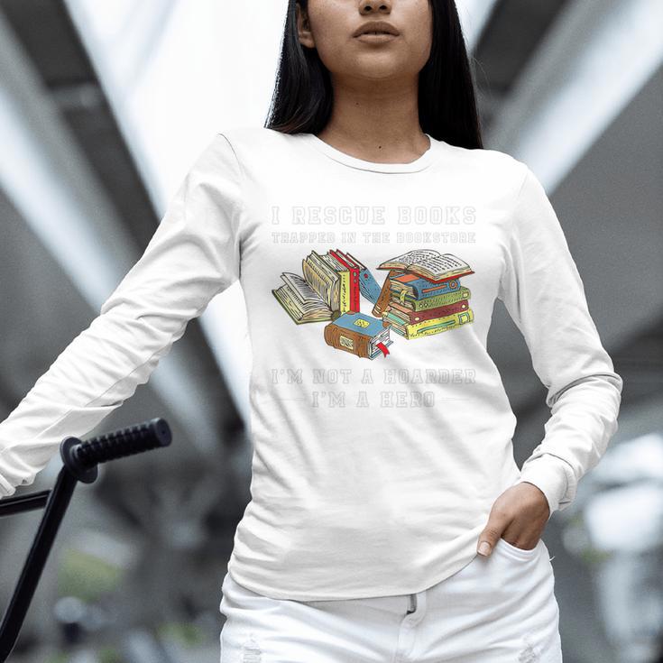 I Rescue Book Trapped In The Bookstore I'm Not A Hoarder Premium Tri-Blend Unisex Long Sleeve T-Shirt I Rescue Book Trapped In The Bookstore I'm Not A Hoarder Premium Tri-Blend Unisex Long Sleeve T-Shirt
