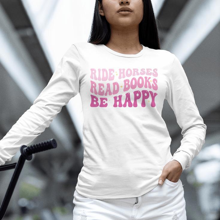 Ride Horses Read Books Be Happy Groovy Book Horse Premium Unisex Long Sleeve T-Shirt Ride Horses Read Books Be Happy Groovy Book Horse Premium Unisex Long Sleeve T-Shirt