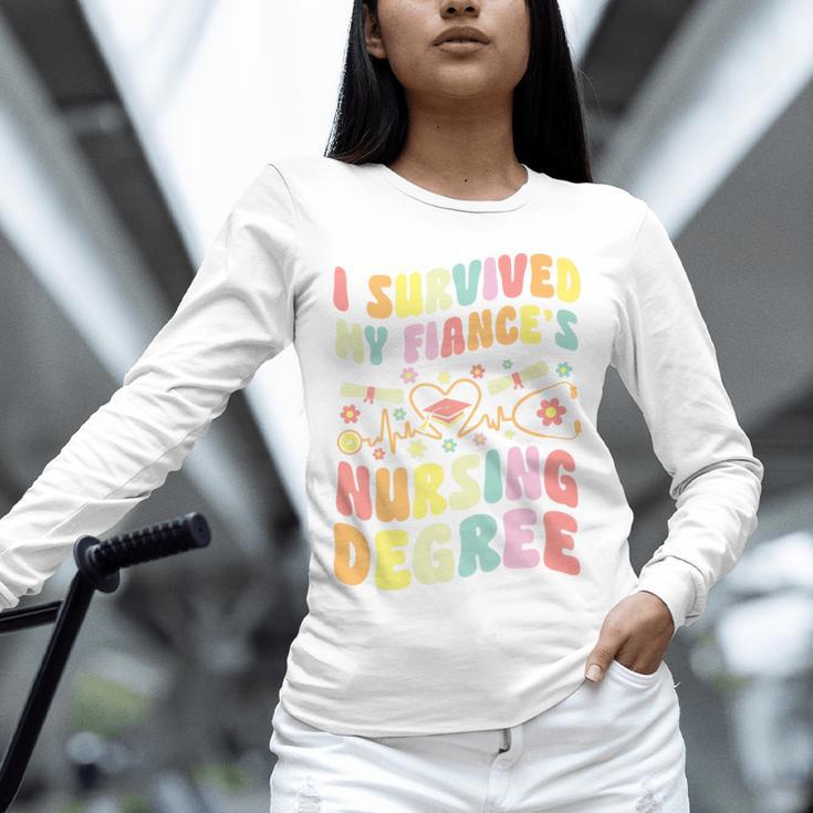 i Survived My Fiance's Nursing Degree Graduation Groovy Premium Unisex Long Sleeve T-Shirt