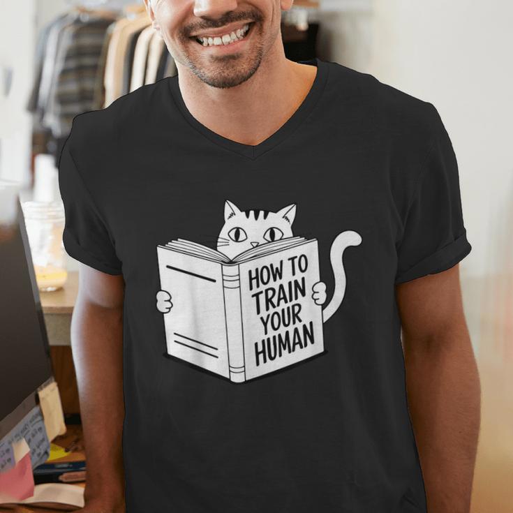 Cat Book Humor How To Train Your Human Men's V-Neck T-Shirt Cat Book Humor How To Train Your Human Men's V-Neck T-Shirt
