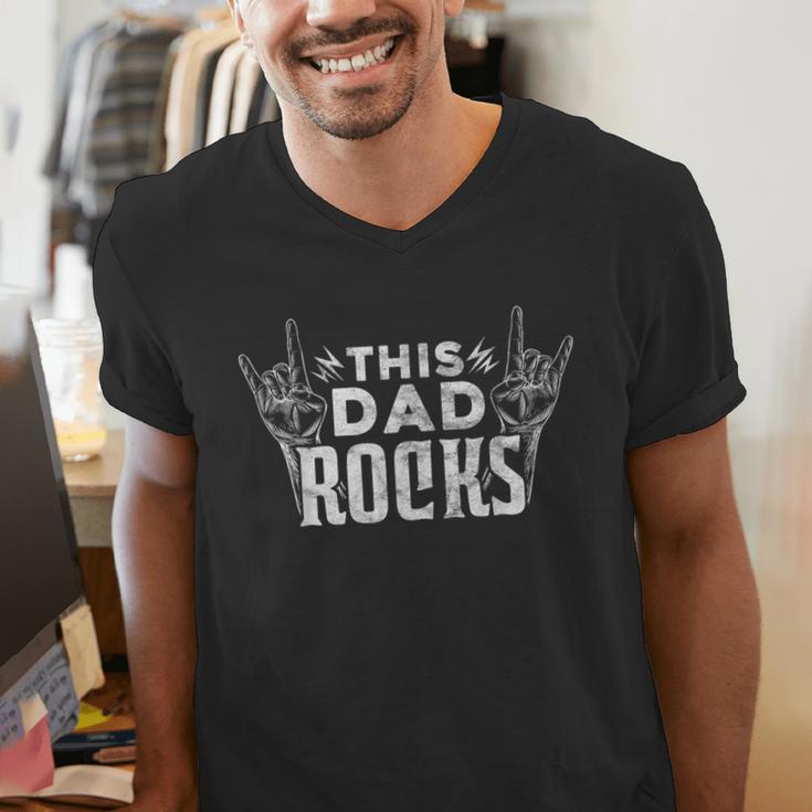 This Dad Rocks Rock n Roll Heavy Metal Fathers Day T-Shirt Men's V-Neck T-Shirt This Dad Rocks Rock n Roll Heavy Metal Fathers Day T-Shirt Men's V-Neck T-Shirt