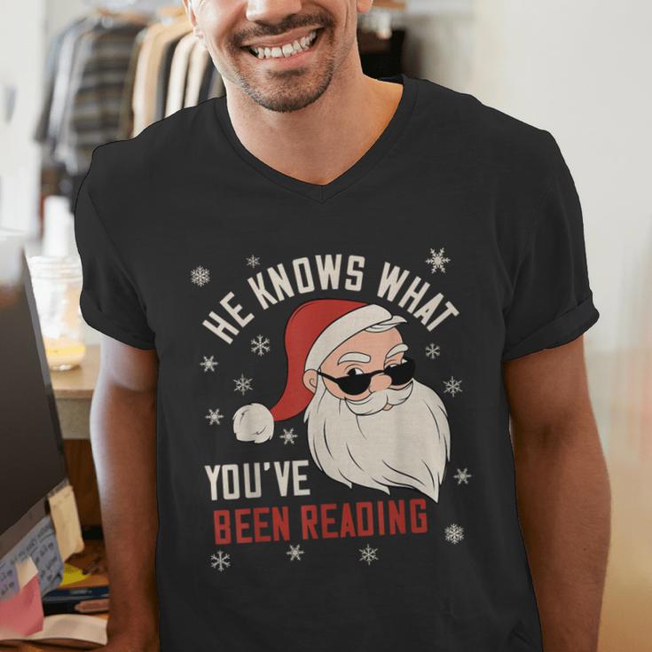 He Knows What You'Ve Been Reading Book Lover Women Santa Men's V-Neck T-Shirt He Knows What You'Ve Been Reading Book Lover Women Santa Men's V-Neck T-Shirt