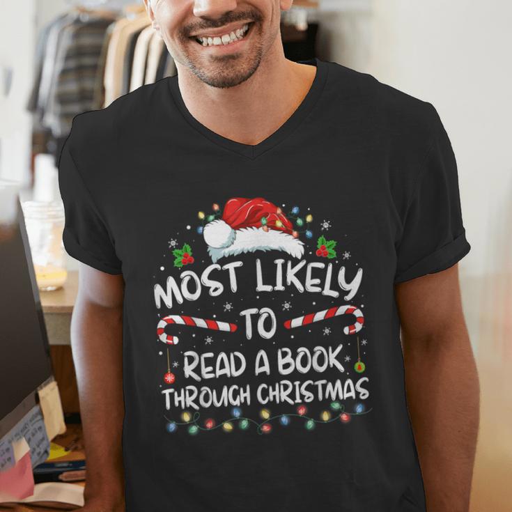 Most Likely To Read A Book Through Christmas Xmas Men's V-Neck T-Shirt Most Likely To Read A Book Through Christmas Xmas Men's V-Neck T-Shirt