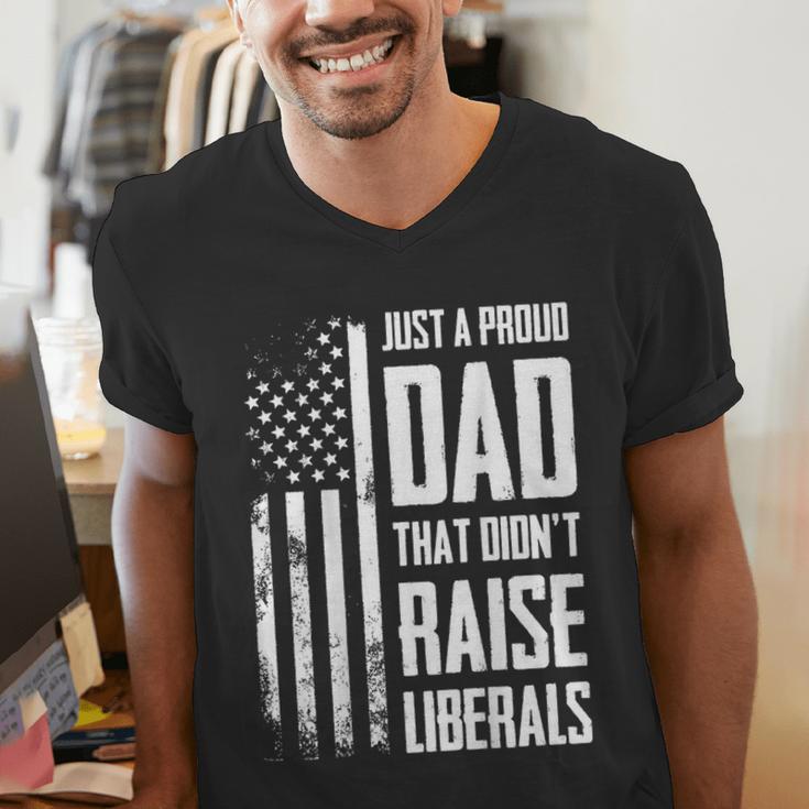 Proud Dad That Didn't Raise Liberals American Flag -ON BACK Women Men Men's V-Neck T-Shirt
