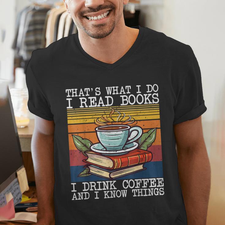 That's What I Do I Read Books Drink Coffee And I Know Things Men's V-Neck T-Shirt