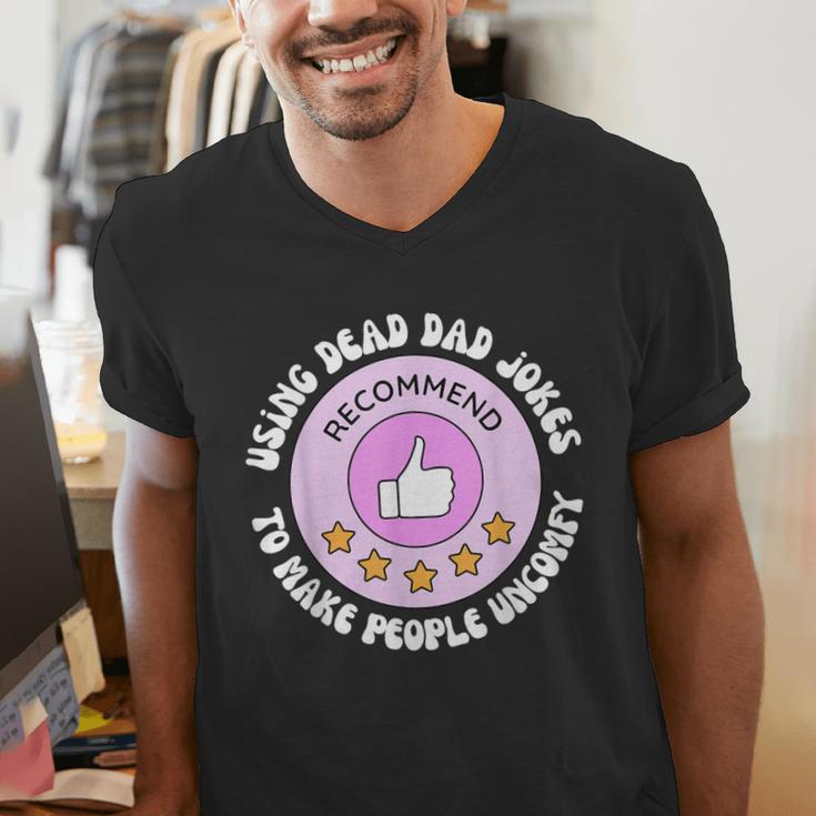 Using Dead Dad Jokes To Make People Uncomfy Vintage Quote Men's V-Neck T-Shirt Using Dead Dad Jokes To Make People Uncomfy Vintage Quote Men's V-Neck T-Shirt