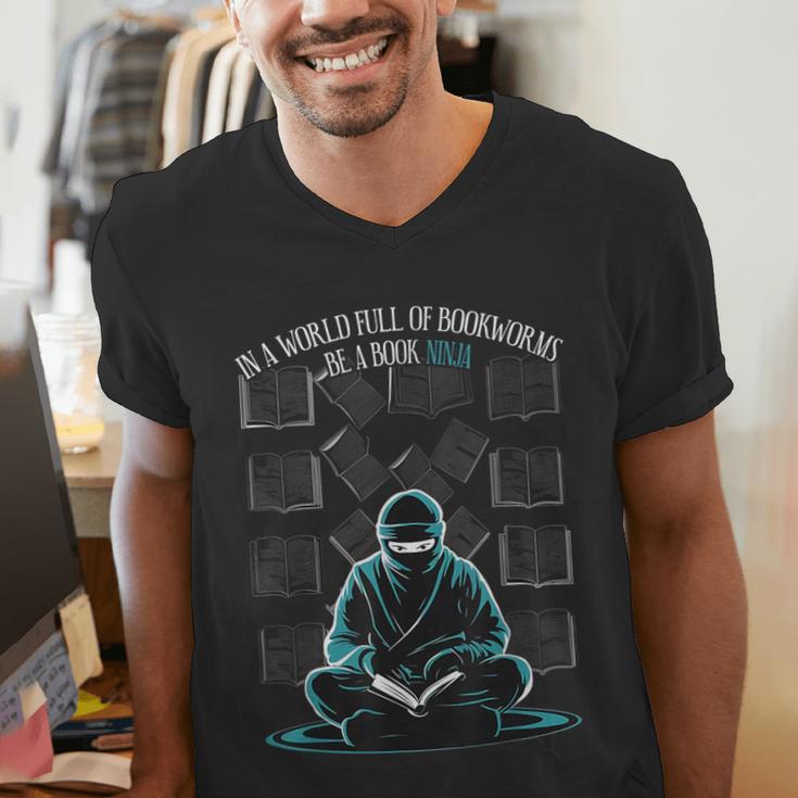 In A World Full Of Bookworms Be A Book Ninja Reading Reader Men's V-Neck T-Shirt