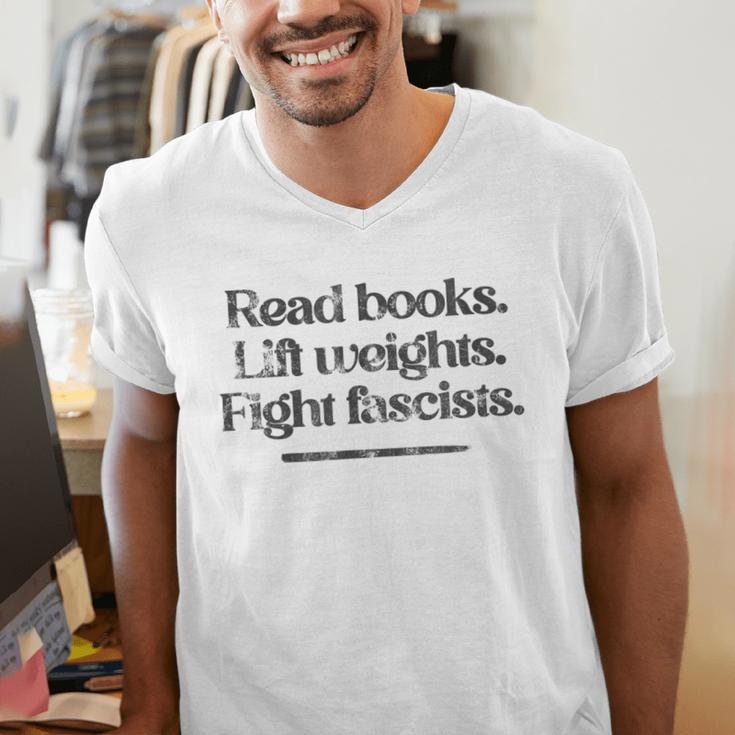 Read Books Lift Weights Fight Fascists Vintage Men's V-Neck T-Shirt Read Books Lift Weights Fight Fascists Vintage Men's V-Neck T-Shirt