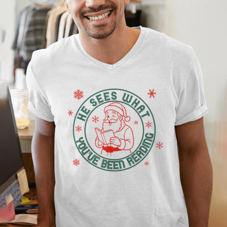 He Sees What You'Ve Been Reading Christmas Book Lover Shirt Men's V-Neck T-Shirt He Sees What You'Ve Been Reading Christmas Book Lover Shirt Men's V-Neck T-Shirt