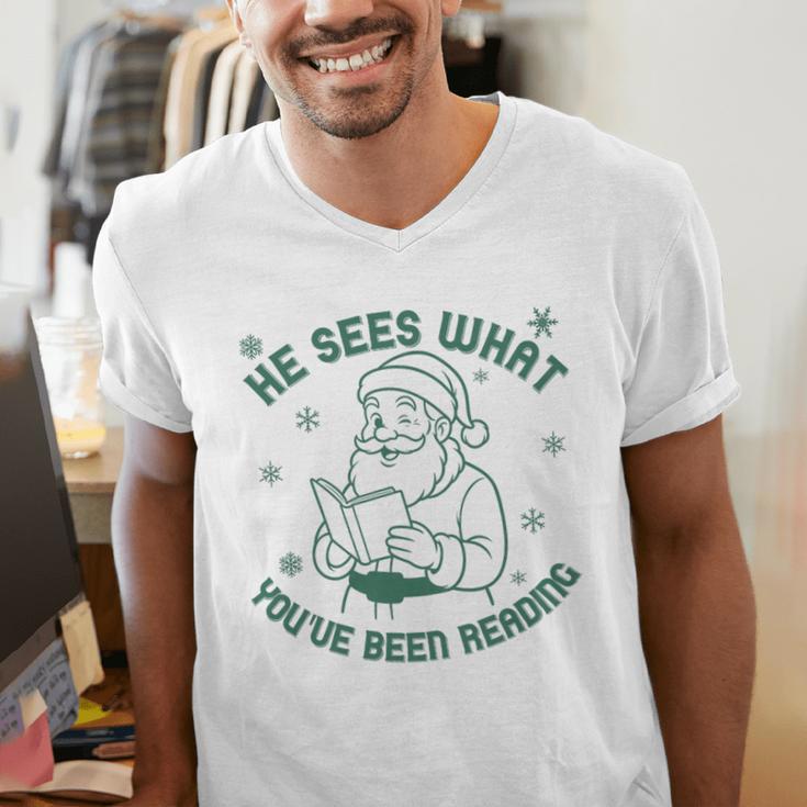 He Sees What You'Ve Been Reading Christmas Bookish Santa Premium Tri-Blend Men's V-Neck T-Shirt He Sees What You'Ve Been Reading Christmas Bookish Santa Premium Tri-Blend Men's V-Neck T-Shirt