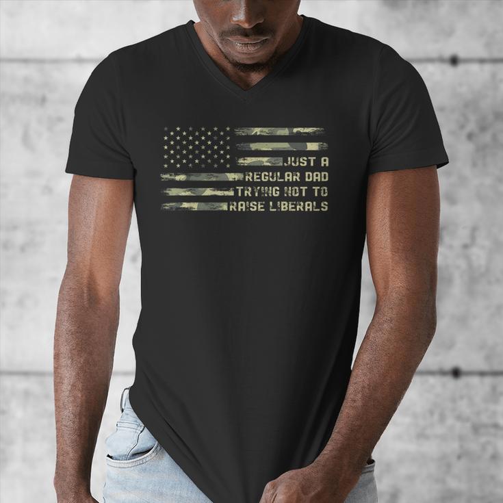 Just a Regular Dad Trying Not To Raise Liberals Camouflage Men's V-Neck T-Shirt