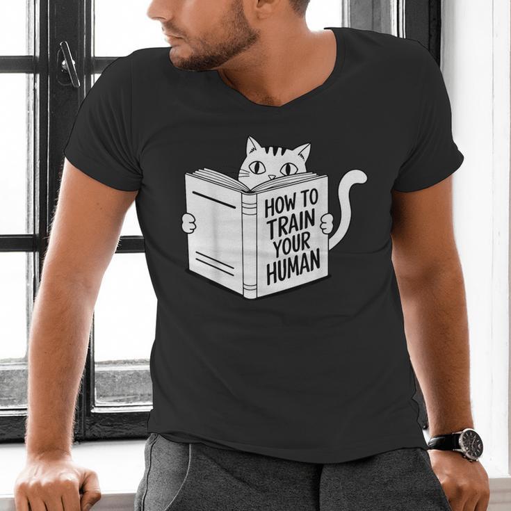 Cat Book Humor How To Train Your Human Men's V-Neck T-Shirt Cat Book Humor How To Train Your Human Men's V-Neck T-Shirt