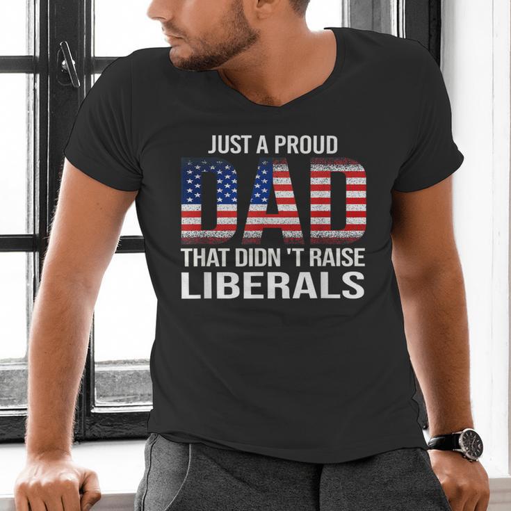 Dad Man Saying Proud Dad That Didn't Raise Liberals Men's V-Neck T-Shirt Dad Man Saying Proud Dad That Didn't Raise Liberals Men's V-Neck T-Shirt
