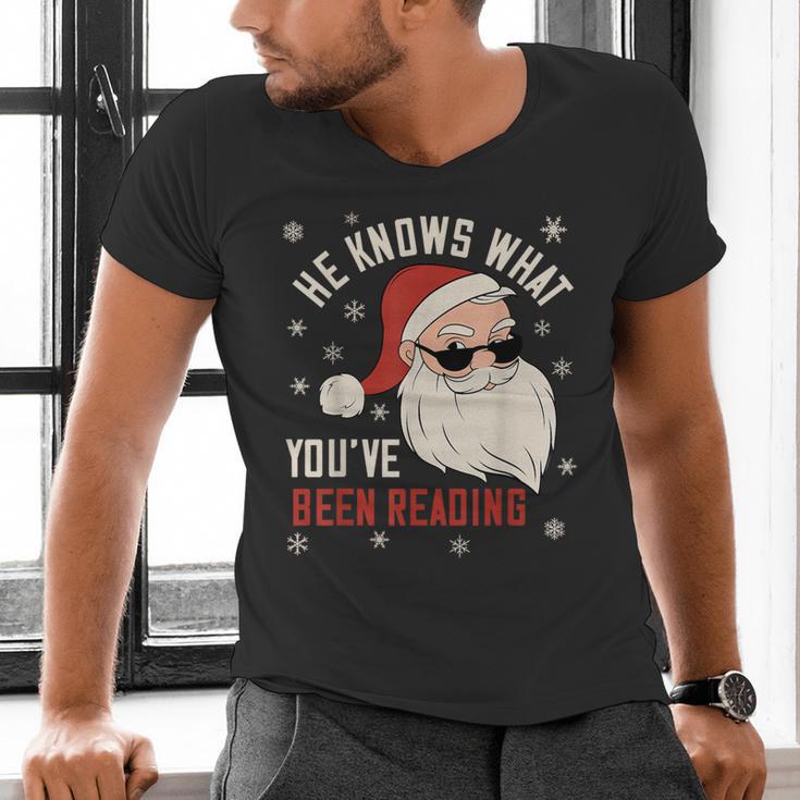 He Knows What You'Ve Been Reading Book Lover Women Santa Men's V-Neck T-Shirt He Knows What You'Ve Been Reading Book Lover Women Santa Men's V-Neck T-Shirt