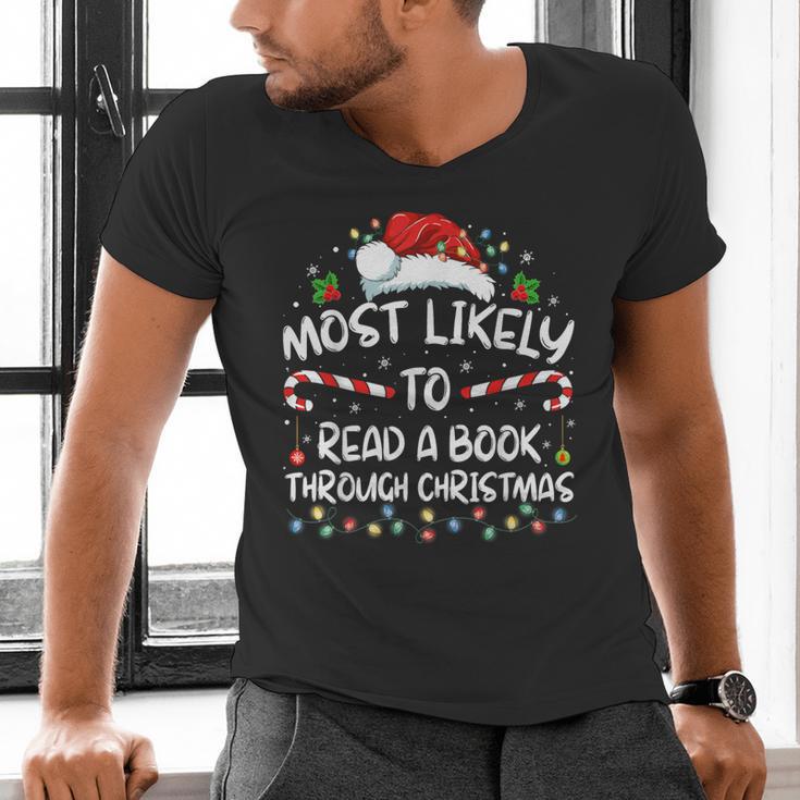 Most Likely To Read A Book Through Christmas Xmas Men's V-Neck T-Shirt Most Likely To Read A Book Through Christmas Xmas Men's V-Neck T-Shirt
