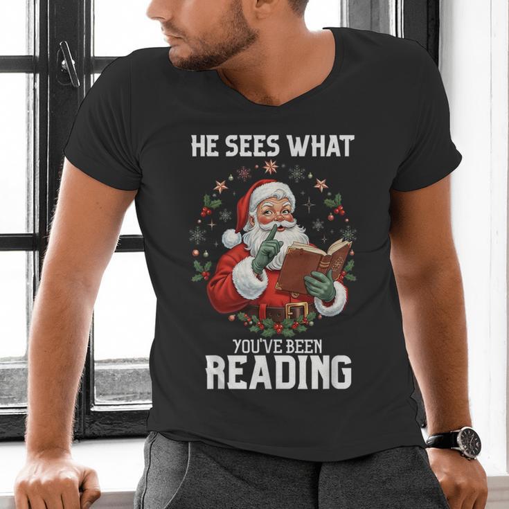 He Sees What You'Ve Been Reading Santa Book Lover Men's V-Neck T-Shirt He Sees What You'Ve Been Reading Santa Book Lover Men's V-Neck T-Shirt