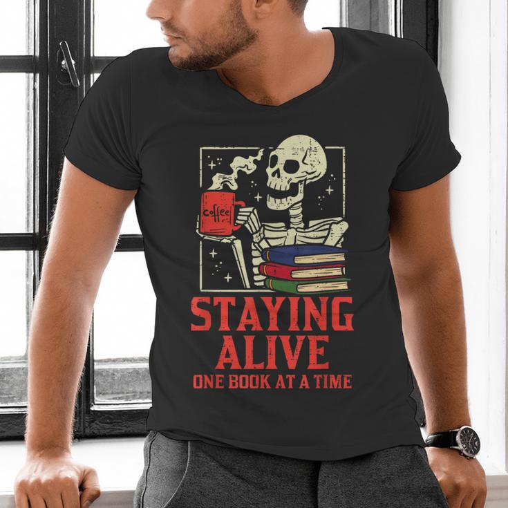 Staying Alive One Book At A Time Skeleton Reading Librarian Men's V-Neck T-Shirt